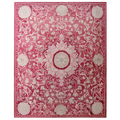 Decorative pink and white floral patterned rug on a white background