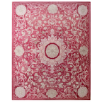 Decorative pink and white floral patterned rug on a white background