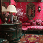 Opulent interior with red rug, walls, ornate furniture, and decorative elements.