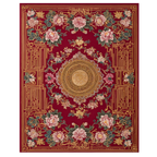 Decorative rug with floral patterns and a central emblem on a red background