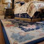 Decorative floral rug in a bedroom with a bed and nightstand.